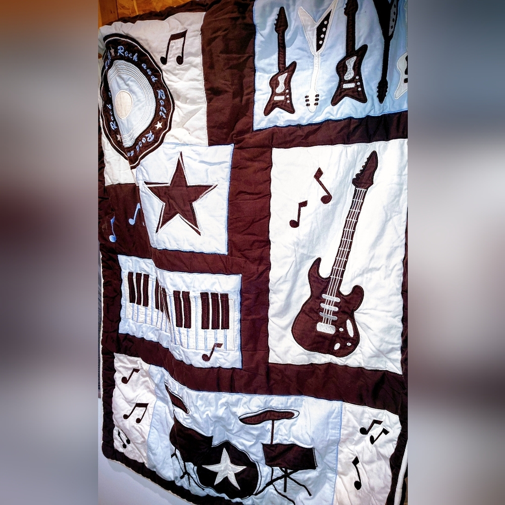 Musical Instrument Themed Brown and White Quilt